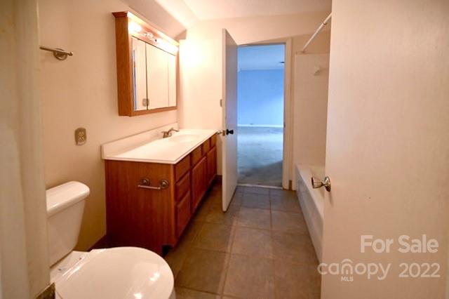 4164 Koala Circle Tega Cay, SC 29708 - Photo 14 of 23 a bathroom with a toilet sink and mirror