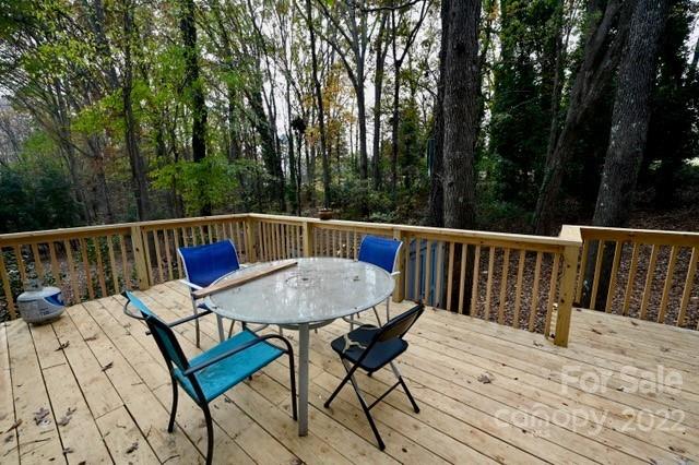 4164 Koala Circle Tega Cay, SC 29708 - Photo 17 of 23 a view of a roof deck with wooden floor and outdoor seating