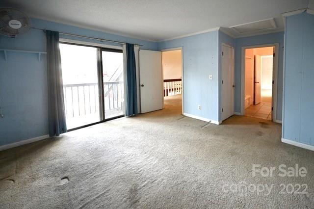4164 Koala Circle Tega Cay, SC 29708 - Photo 9 of 23 an empty room with windows and closet