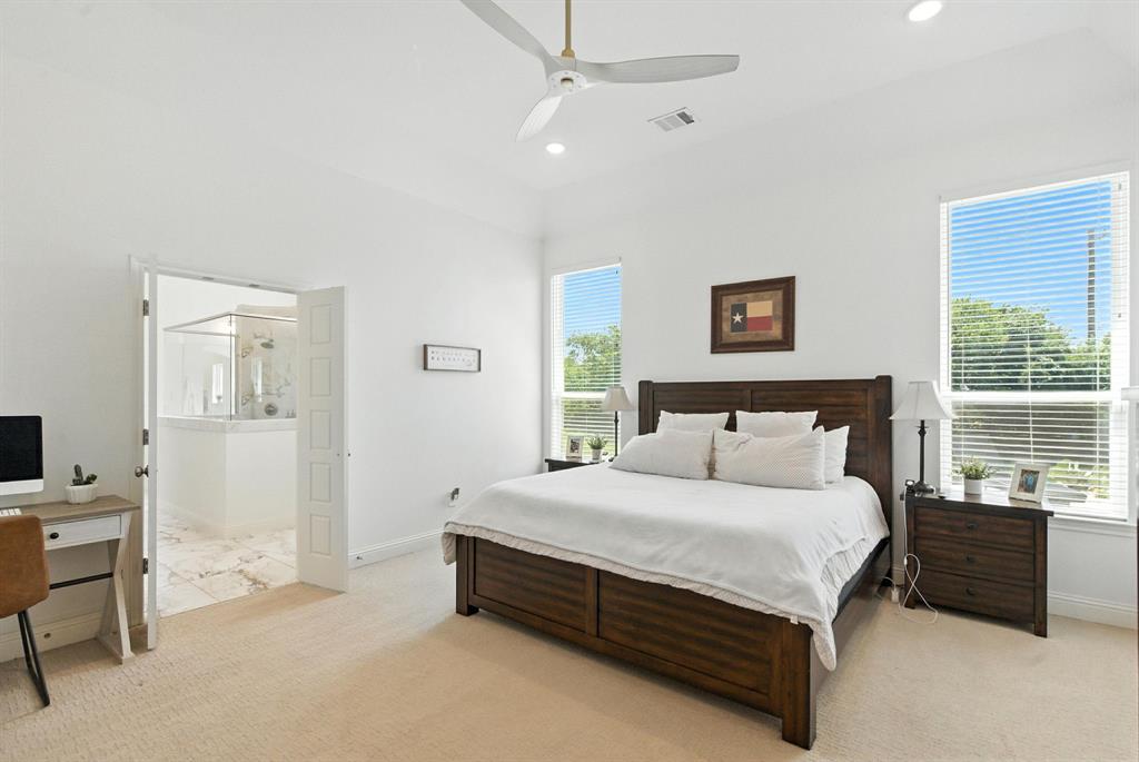 363 Red Bird Drive Springtown, TX 76082 - Photo 19 of 40 a bedroom with a bed and a window