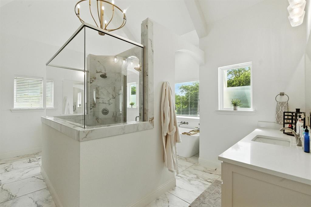 363 Red Bird Drive Springtown, TX 76082 - Photo 21 of 40 a bathroom with a sink a toilet and shower