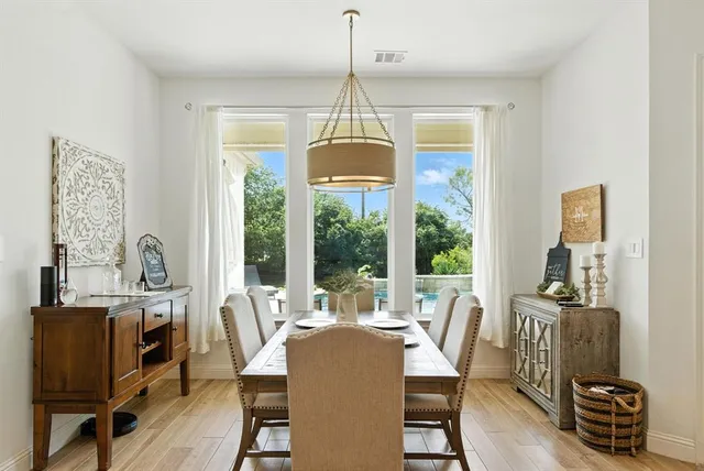 a dining room with furniture window wooden floor