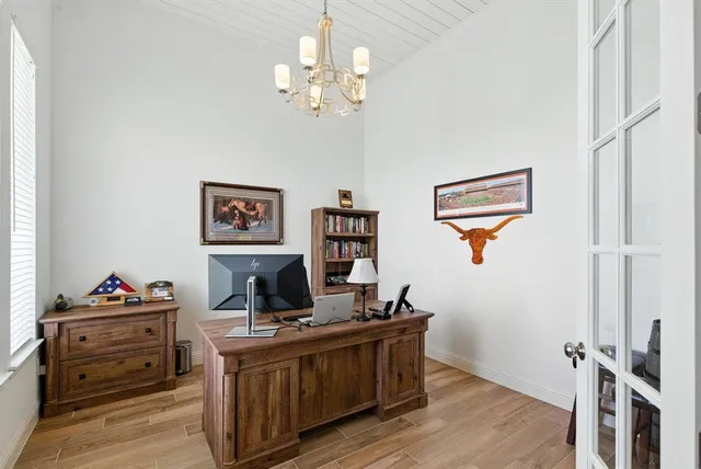 a view of a workspace with furniture