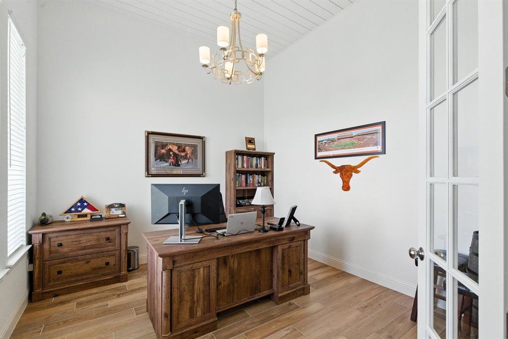 363 Red Bird Drive Springtown, TX 76082 - Photo 32 of 40 a view of a workspace with furniture