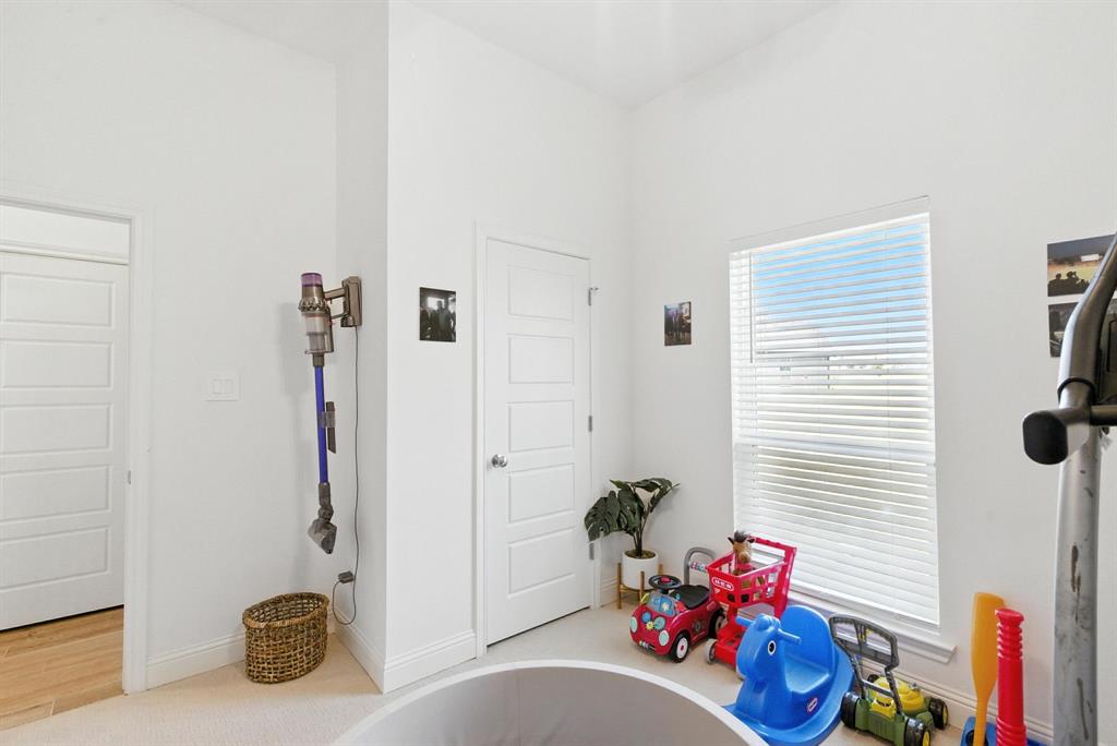 363 Red Bird Drive Springtown, TX 76082 - Photo 36 of 40 a bedroom with furniture and a window