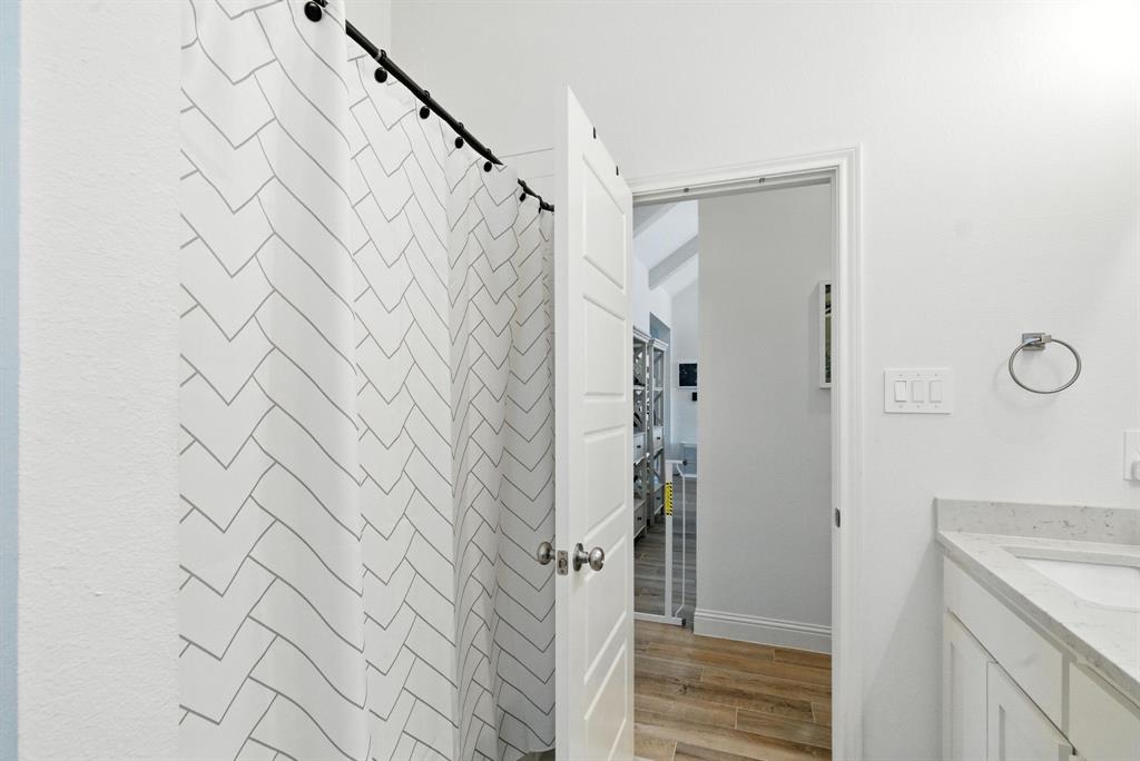 363 Red Bird Drive Springtown, TX 76082 - Photo 39 of 40 a bathroom with a shower and a sink