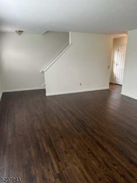 2 Magnolia Court, Unit 2A Madison, NJ 07940 - Photo 11 of 16 a view of a room with wooden floor