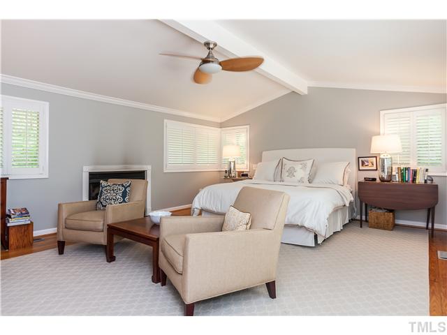 1732 Brooks Avenue Raleigh, NC 27607 - Photo 17 of 24 a bedroom with a bed couch and a window