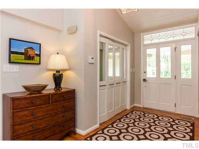 1732 Brooks Avenue Raleigh, NC 27607 - Photo 2 of 24 a view of a dresser with wooden floor and furniture