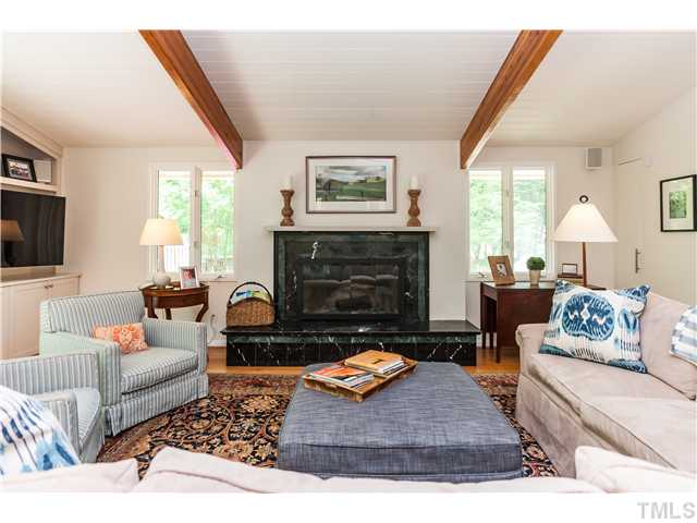 1732 Brooks Avenue Raleigh, NC 27607 - Photo 5 of 24 a living room with furniture and a fireplace