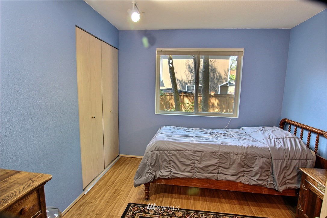 26412 231st Place Southeast Maple Valley, WA 98038 - Photo 4 of 18 a bedroom with a bed and a window