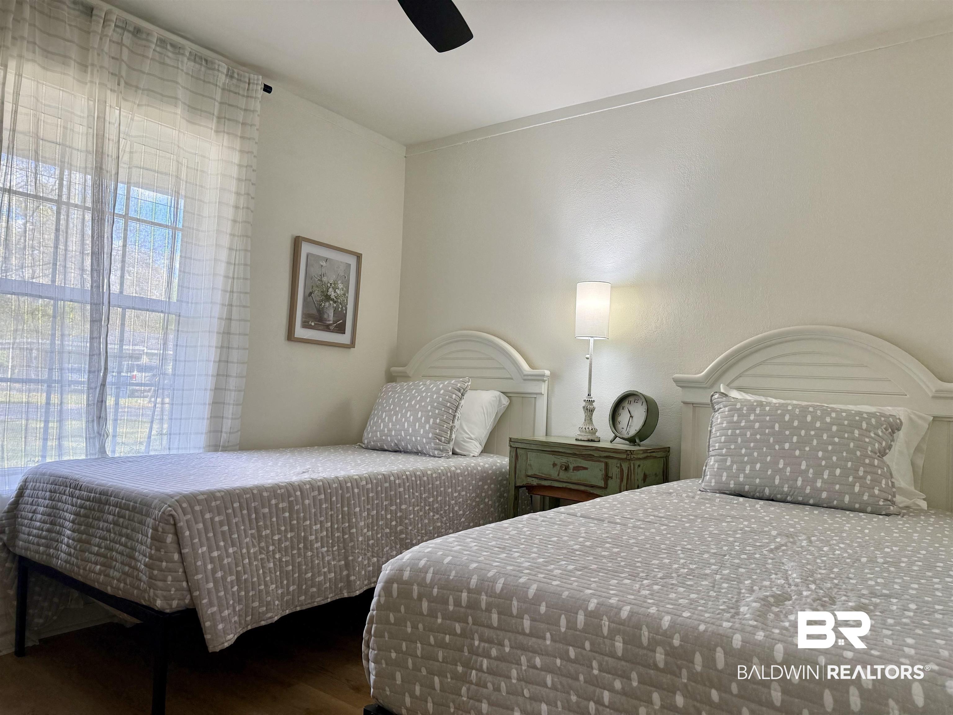 107 Dawson Street Brewton, AL 36426 - Photo 12 of 15 Bedroom with wood finished floors and ceiling fan