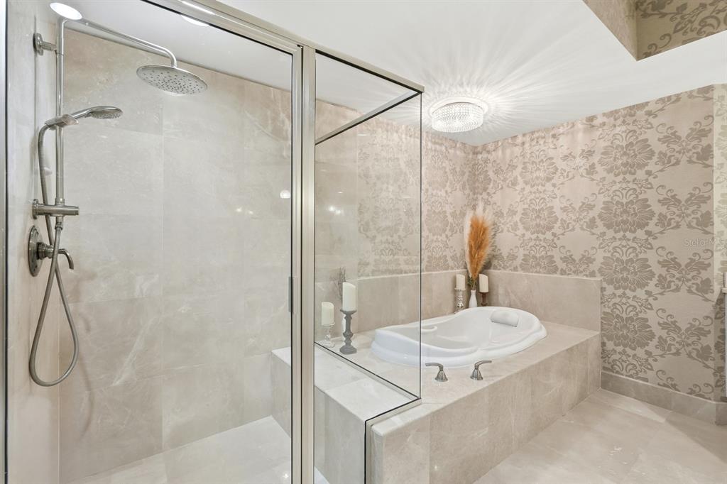 231 Riverside Drive, Unit 1702 Holly Hill, FL 32117 - Photo 25 of 74 a bathroom with a shower and a sink