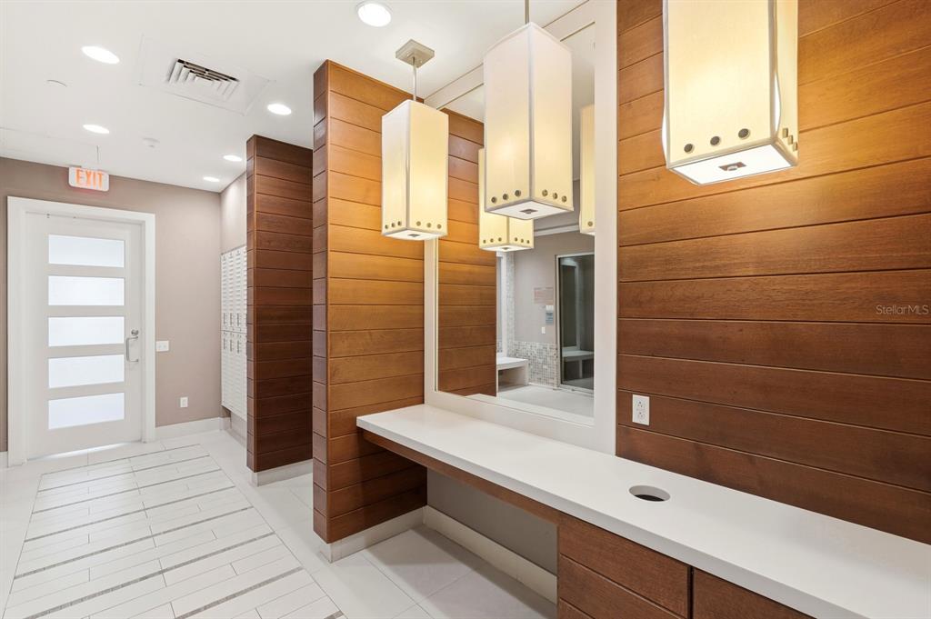 231 Riverside Drive, Unit 1702 Holly Hill, FL 32117 - Photo 61 of 74 a bathroom with a shower and a sink