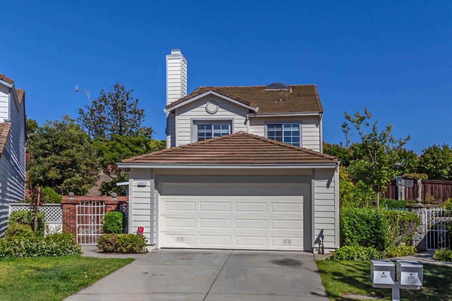 2372 Dubois Street Milpitas, CA 95035 - Photo 2 of 30 a house that has a tree in front of the house