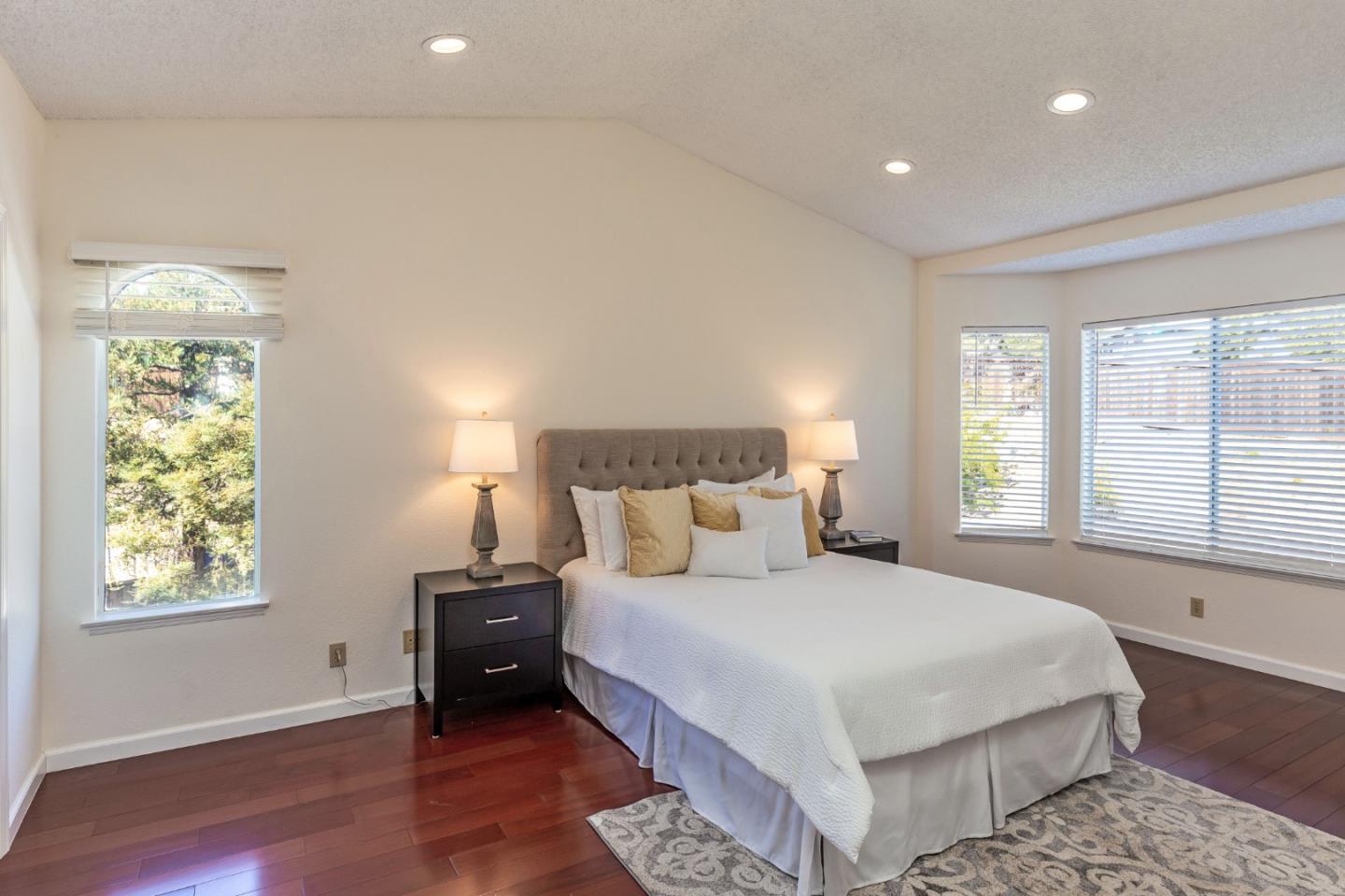 2372 Dubois Street Milpitas, CA 95035 - Photo 13 of 30 a bedroom with a large bed and a window