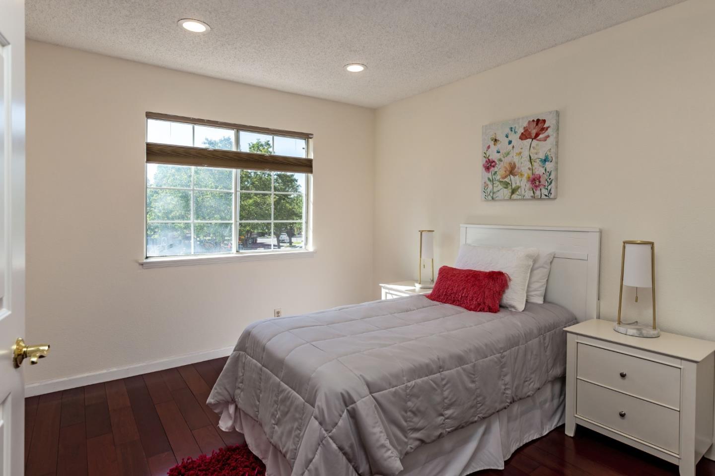 2372 Dubois Street Milpitas, CA 95035 - Photo 18 of 30 a bedroom with a bed and a window