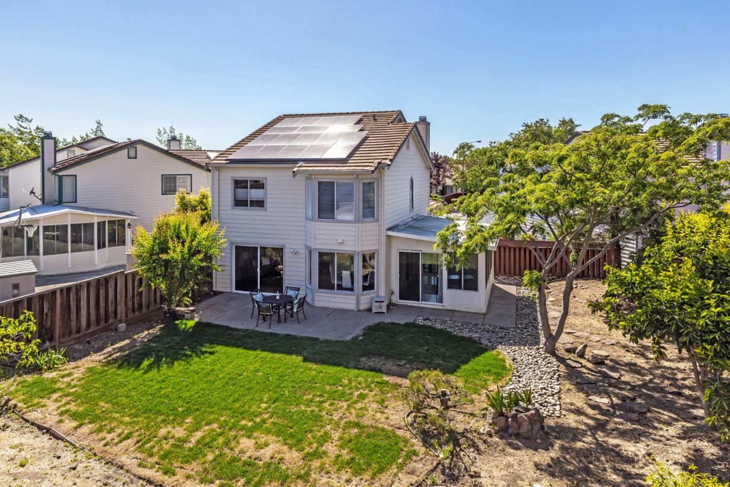 2372 Dubois Street Milpitas, CA 95035 - Photo 22 of 30 a front view of house with yard and outdoor seating