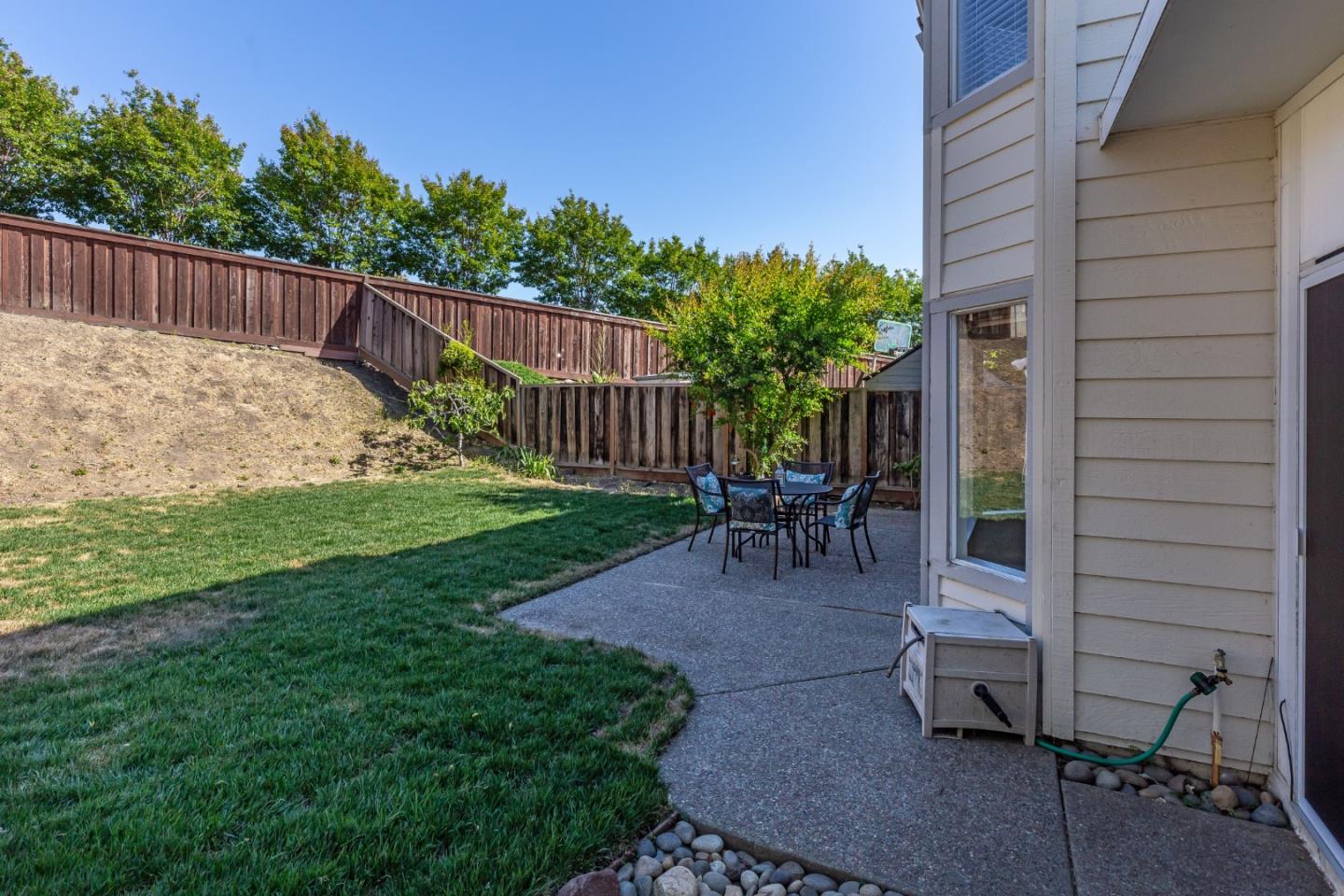 2372 Dubois Street Milpitas, CA 95035 - Photo 24 of 30 a view of a backyard with a patio and a garden