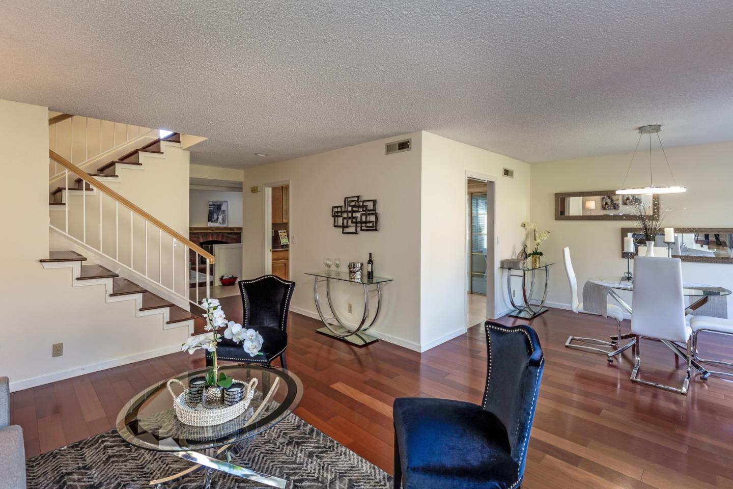 2372 Dubois Street Milpitas, CA 95035 - Photo 7 of 30 a living room with furniture and wooden floor