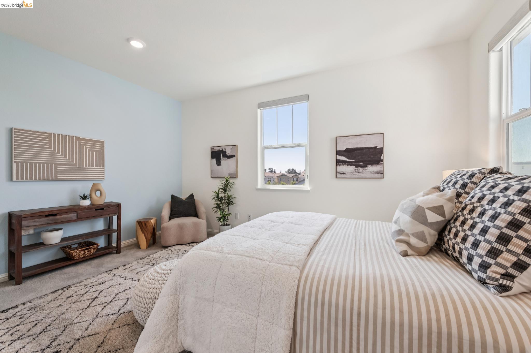 24157 Amaranth Loop Hayward, CA 94541 - Photo 43 of 63 Room featuring light blue accent wall and white walls