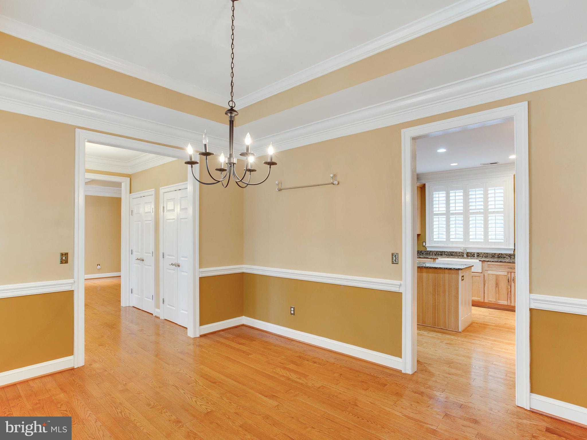 6239 Solomons Island Road Tracys Landing, MD 20779 - Photo 13 of 54 Beautiful wood floors in this dining area.