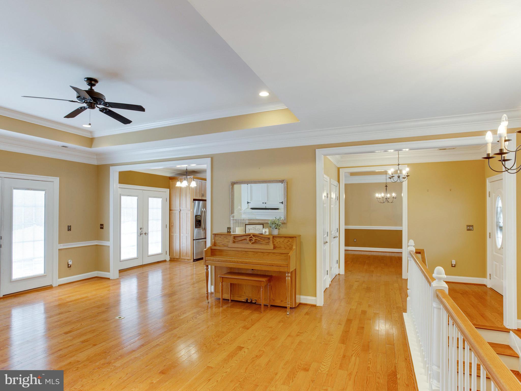 6239 Solomons Island Road Tracys Landing, MD 20779 - Photo 21 of 54 French doors and plantation shutters throughout.