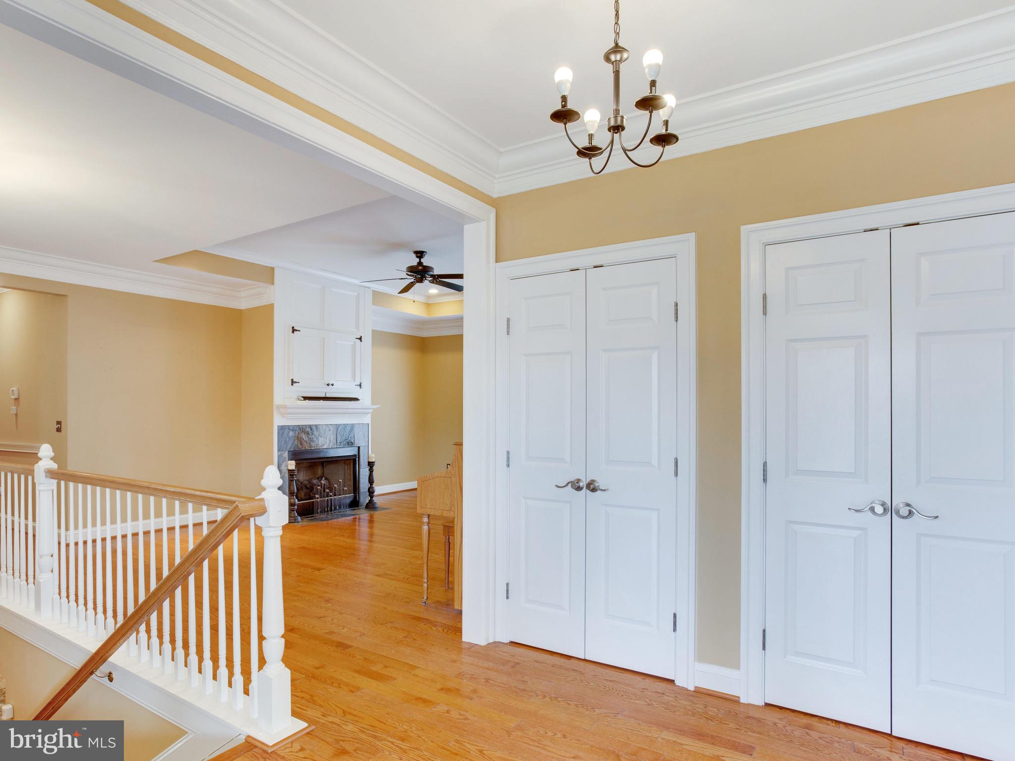 6239 Solomons Island Road Tracys Landing, MD 20779 - Photo 54 of 54 Open floor plan w/ wood floors & crown molding.