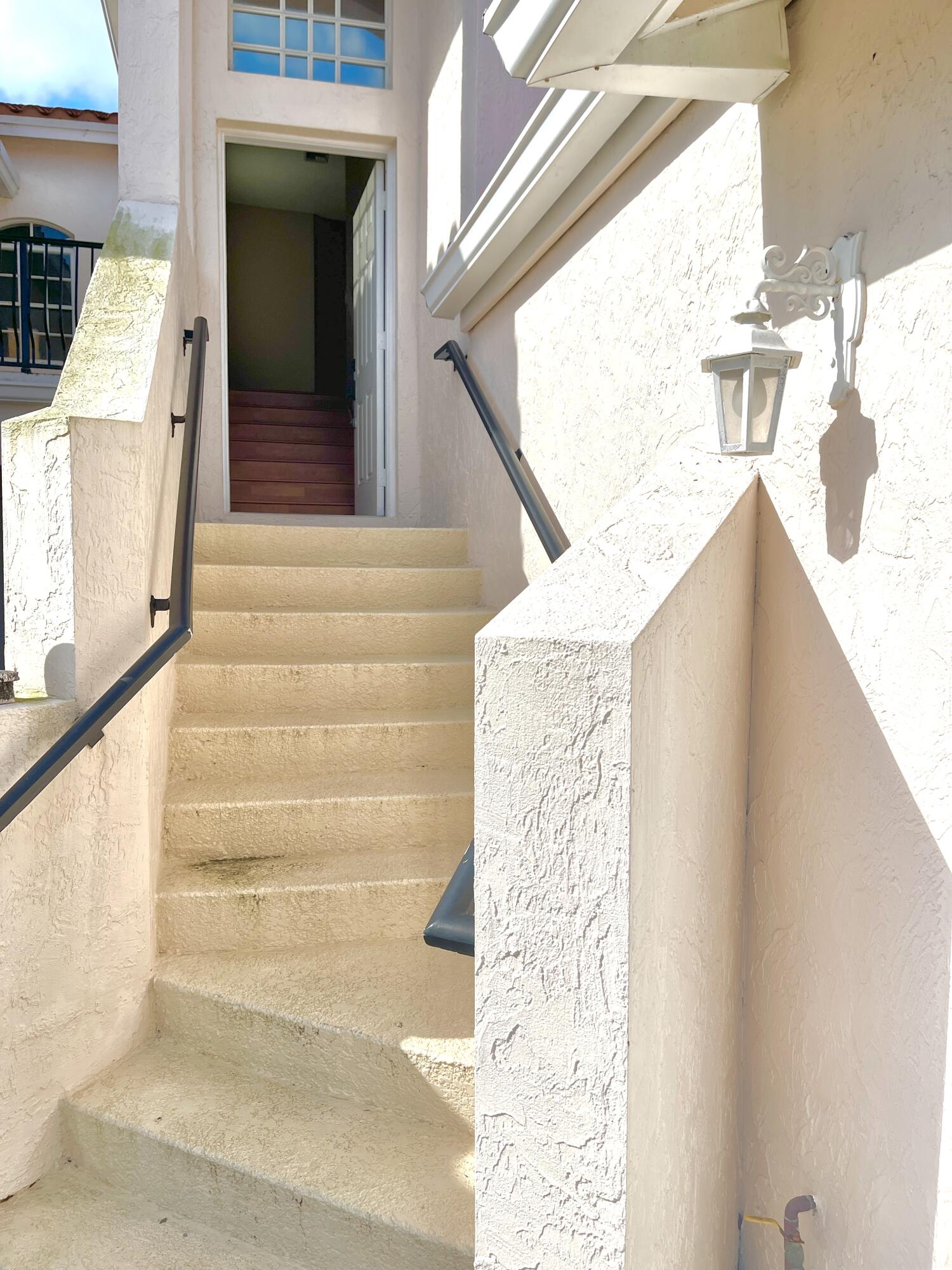 8550 Vía Romana, Unit 2 Boca Raton, FL 33496 - Photo 3 of 28 a view of entryway with a front door