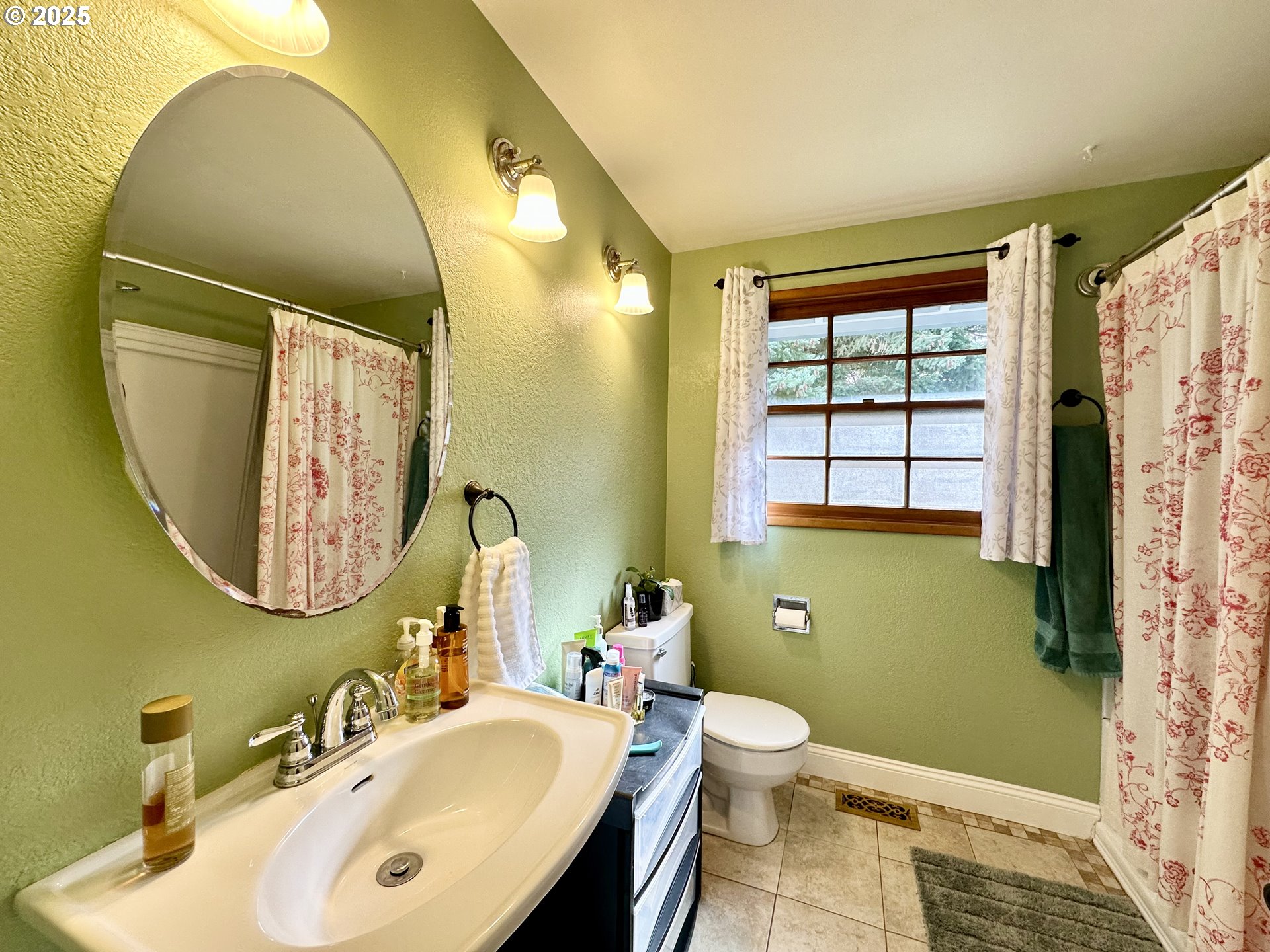 1563 Southeast 11th Street Gresham, OR 97080 - Photo 18 of 30 a bathroom with a sink and a mirror