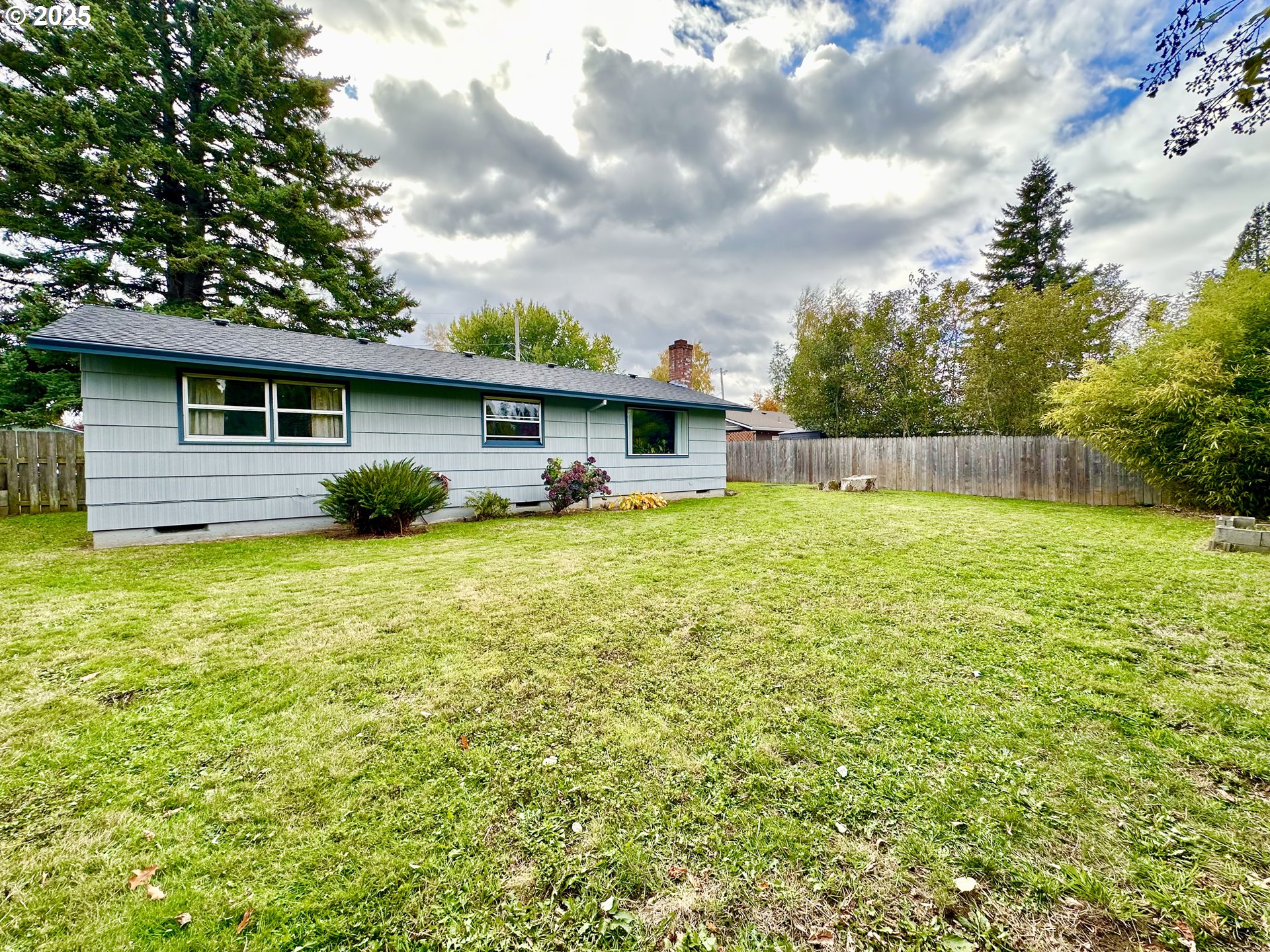 1563 Southeast 11th Street Gresham, OR 97080 - Photo 26 of 30 a view of a house with a yard and sitting area