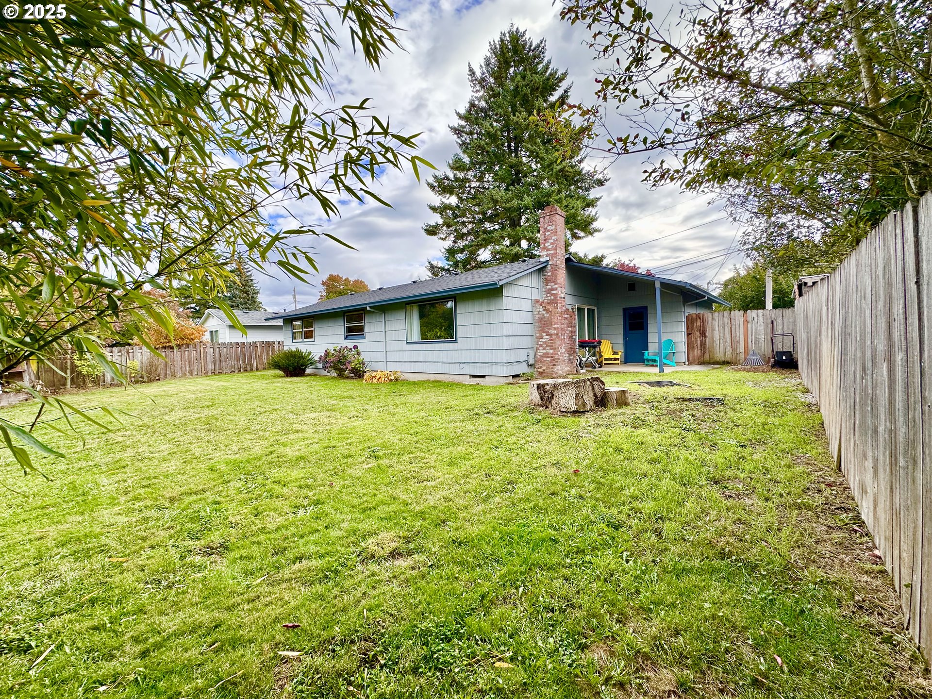 1563 Southeast 11th Street Gresham, OR 97080 - Photo 27 of 30 a front view of house with yard and trees
