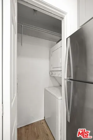a close view of a refrigerator in kitchen and a refrigerator in kitchen