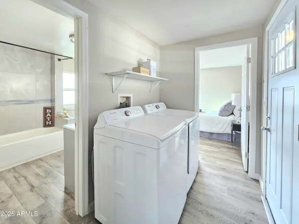 a utility room with dryer and washer