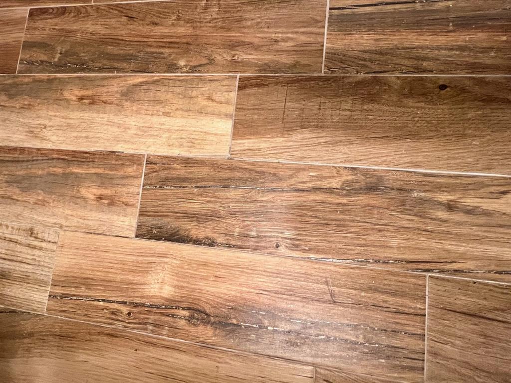 3002 Northeast 5th Terrace, Unit 102B Wilton Manors, FL 33334 - Photo 27 of 44 a view of empty room with an empty space