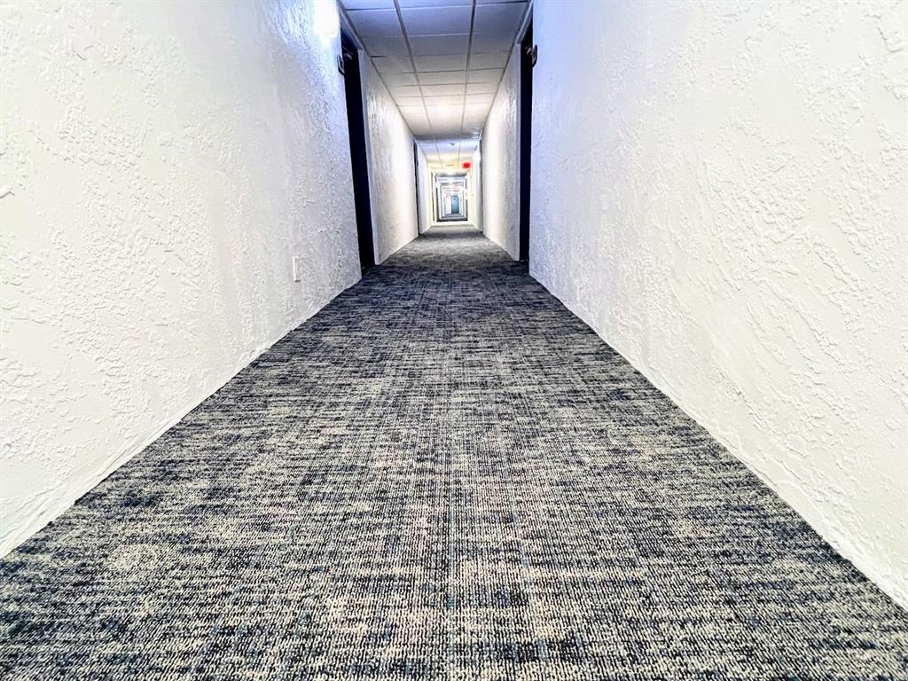 3002 Northeast 5th Terrace, Unit 102B Wilton Manors, FL 33334 - Photo 37 of 44 a view of empty room