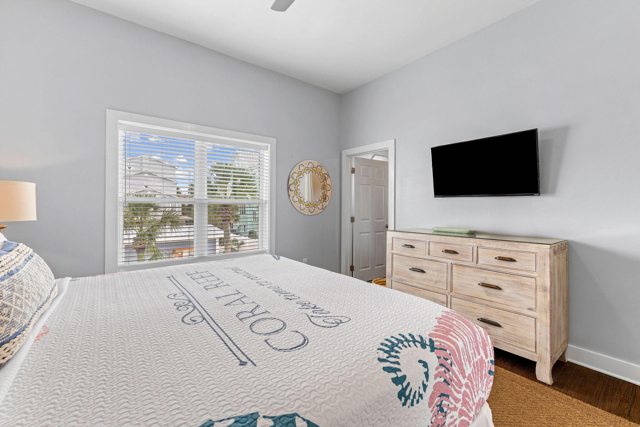 49 Sandy Lane Santa Rosa Beach, FL 32459 - Photo 22 of 73 a bedroom with a bed a flat screen tv and a window