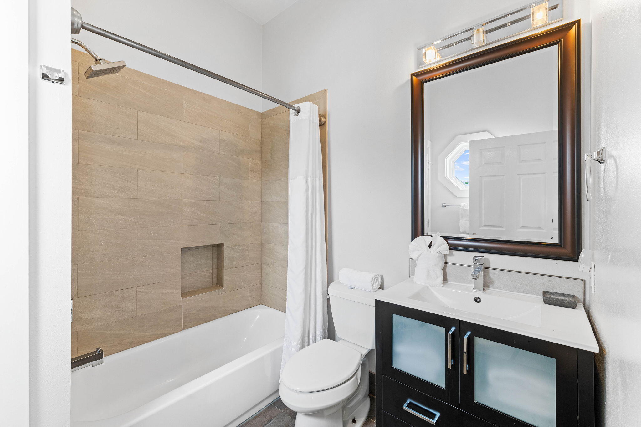 49 Sandy Lane Santa Rosa Beach, FL 32459 - Photo 23 of 73 a bathroom with a double vanity sink toilet mirror and shower