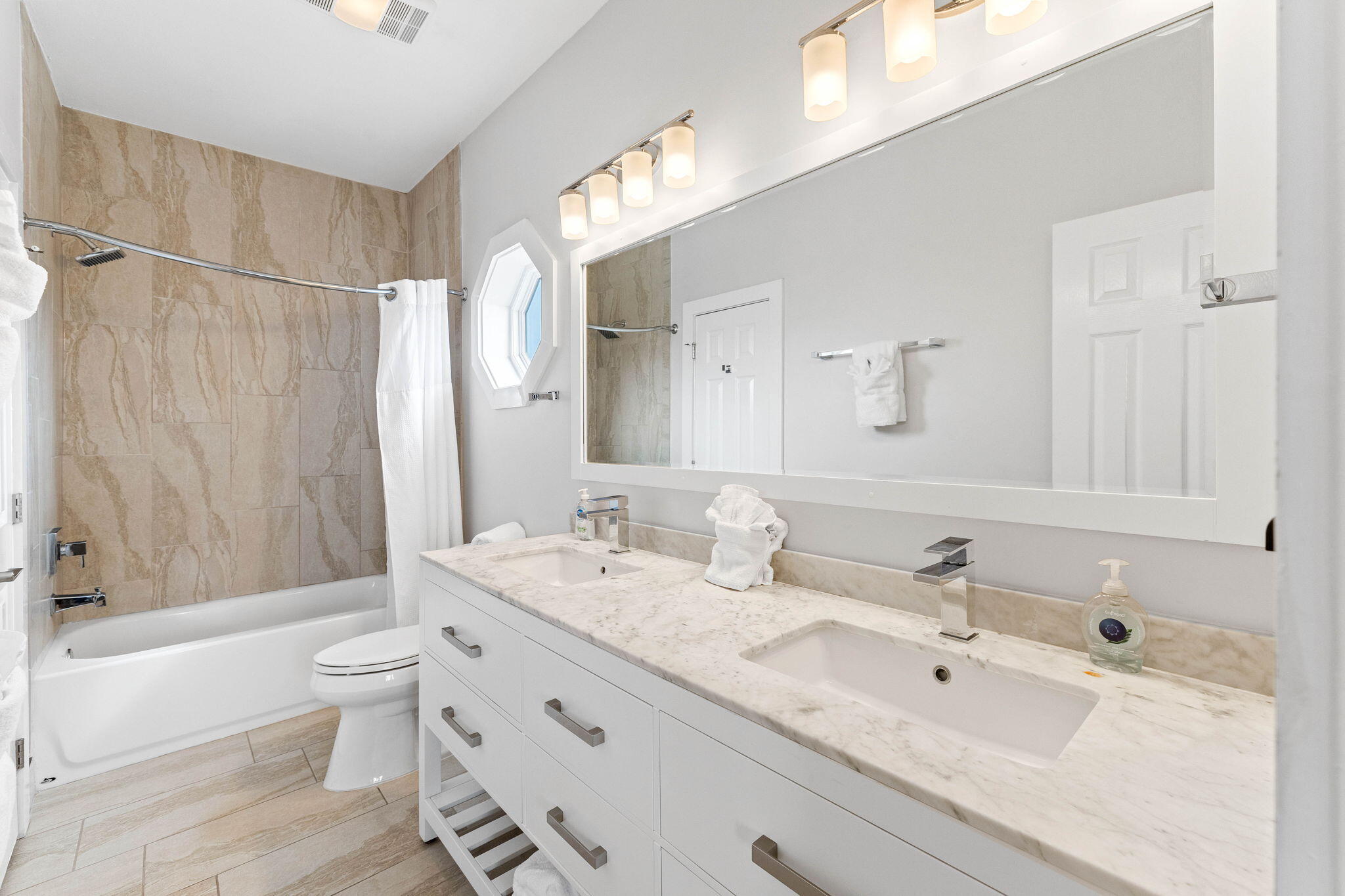 49 Sandy Lane Santa Rosa Beach, FL 32459 - Photo 30 of 73 a bathroom with a double vanity sink mirror double and a bathtub