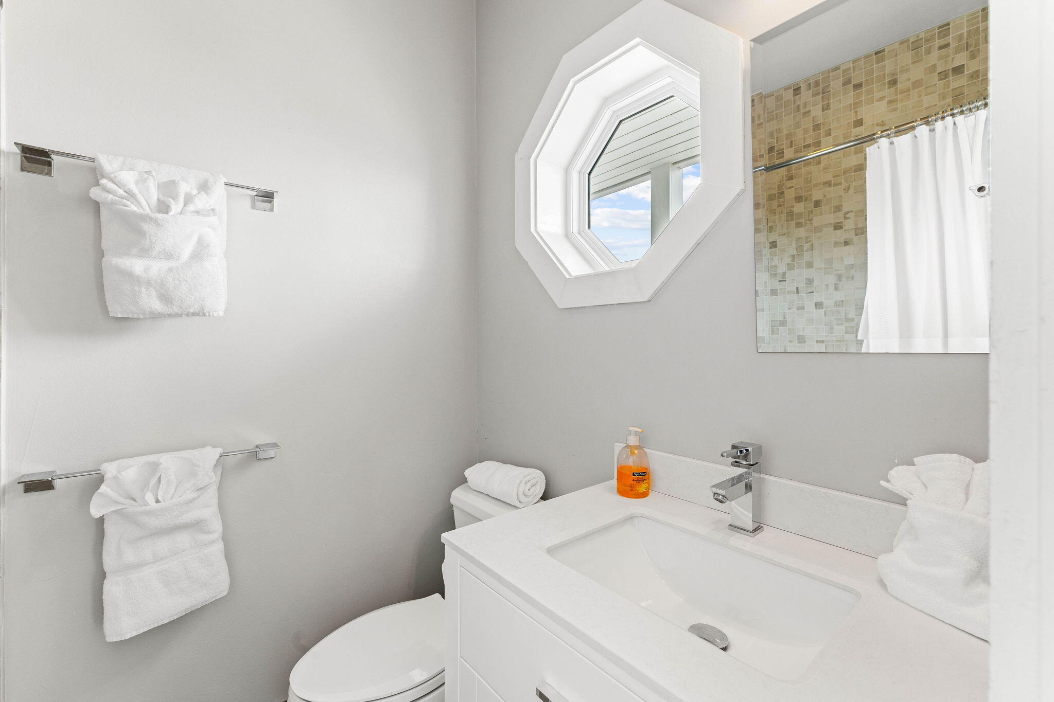 49 Sandy Lane Santa Rosa Beach, FL 32459 - Photo 34 of 73 a bathroom with a sink a toilet and a mirror