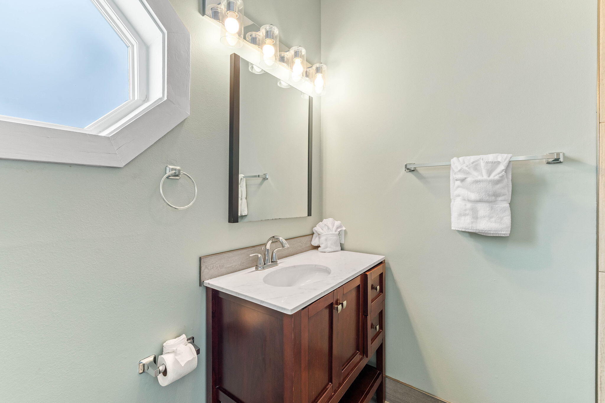49 Sandy Lane Santa Rosa Beach, FL 32459 - Photo 37 of 73 a bathroom with a sink vanity and a mirror