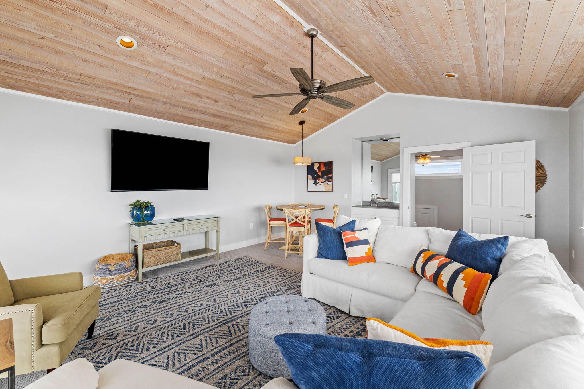 49 Sandy Lane Santa Rosa Beach, FL 32459 - Photo 42 of 73 a living room with furniture and a flat screen tv