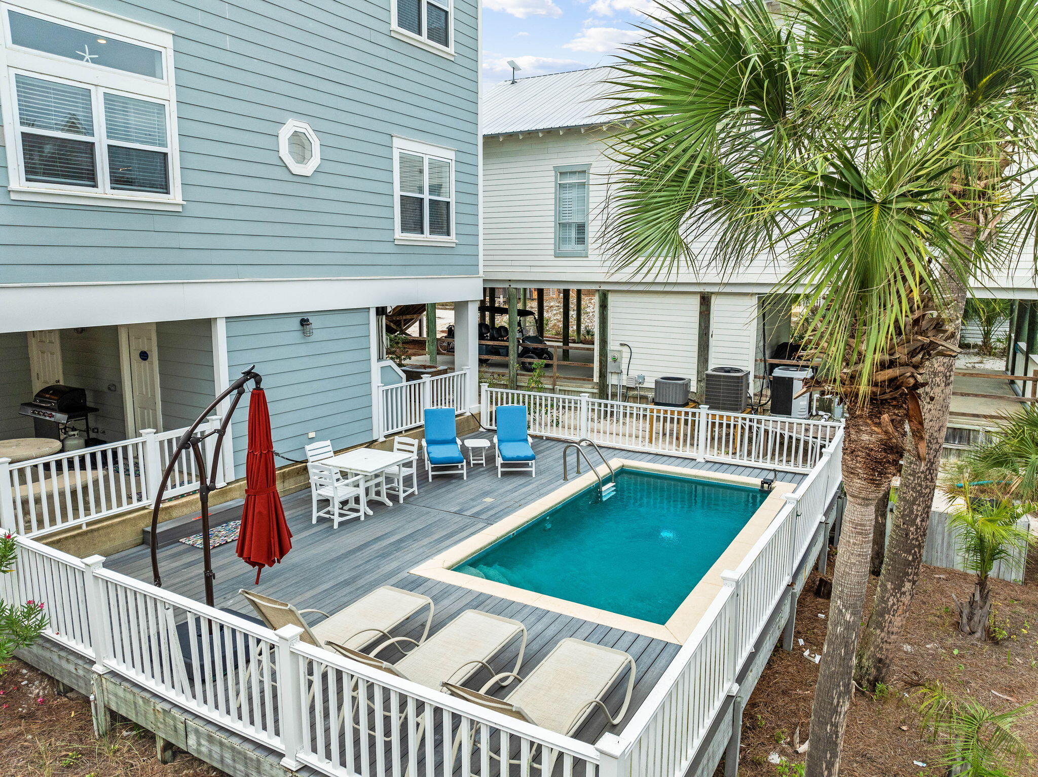 49 Sandy Lane Santa Rosa Beach, FL 32459 - Photo 48 of 73 a view of a house with swimming pool and sitting area