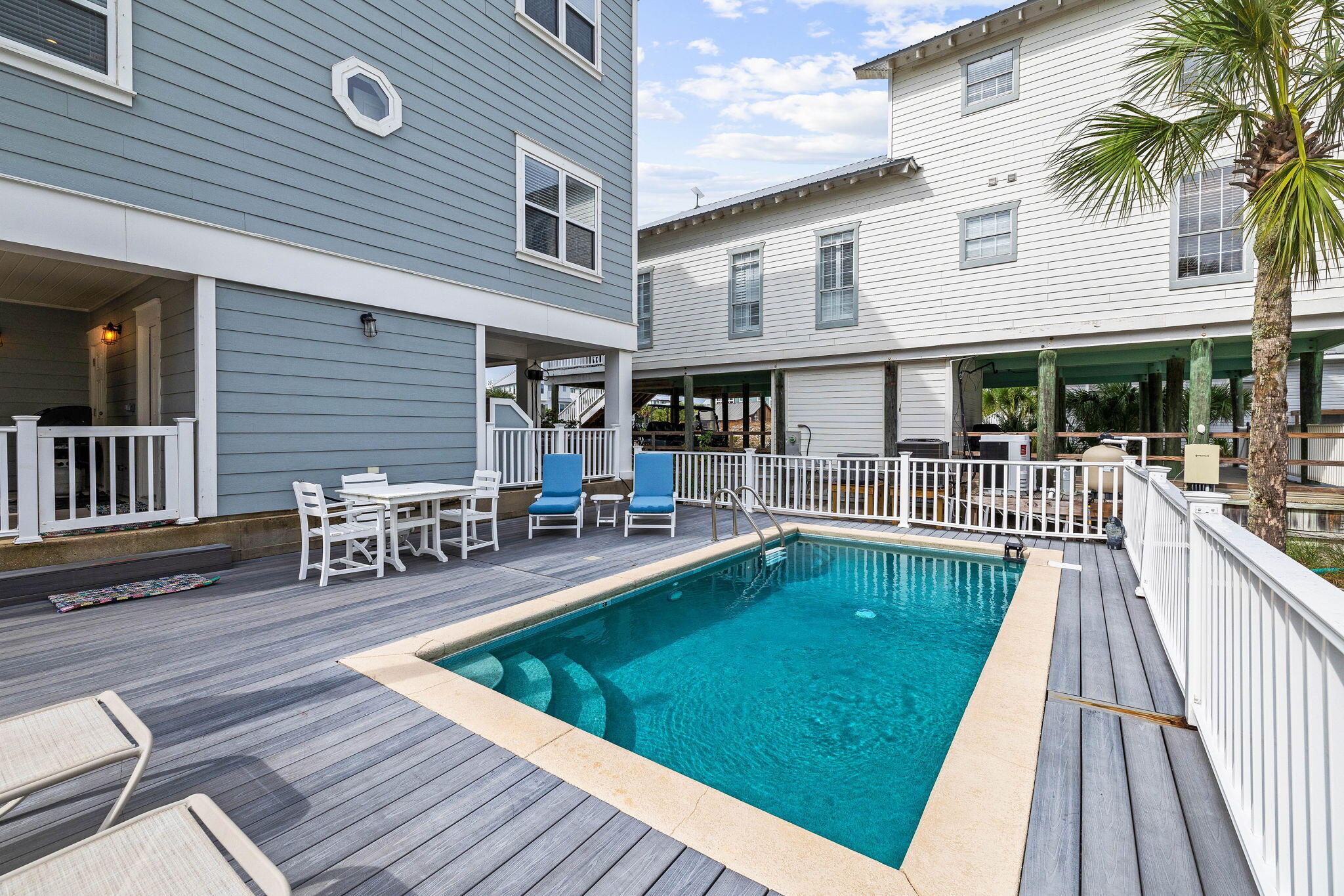 49 Sandy Lane Santa Rosa Beach, FL 32459 - Photo 49 of 73 a view of a patio with dining table and chairs