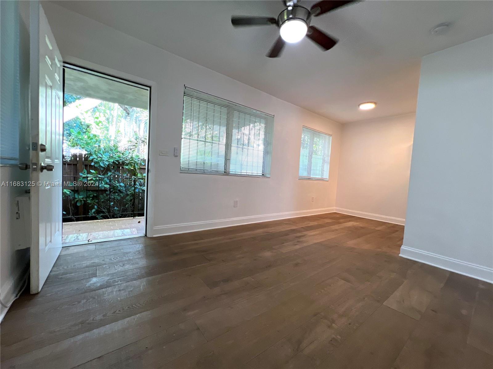 541 Northeast 63rd Street, Unit 3 Miami, FL 33138 - Photo 2 of 19 a view of an empty room with a window