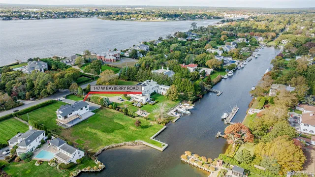 a view of entryway with a window and wooden floor