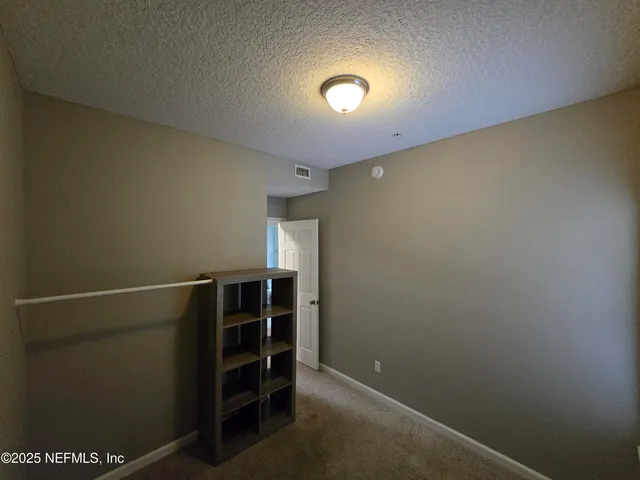 an aerial view of a house with a swimming pool outdoor seating and yard