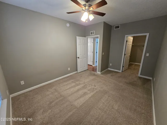 a view of swimming pool with outdoor seating
