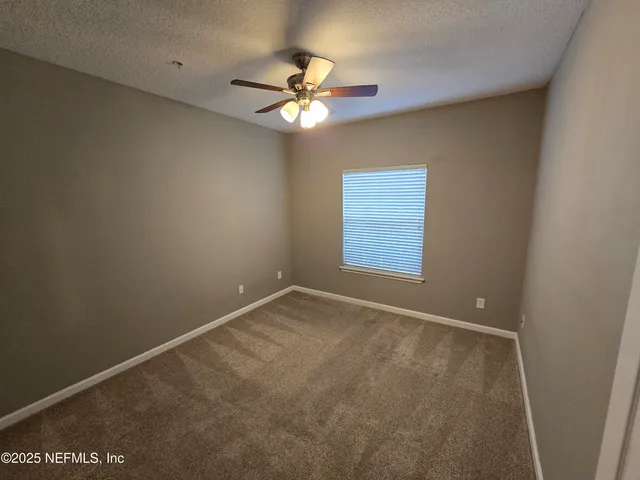 a view of swimming pool with outdoor seating