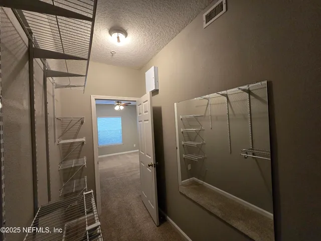 a view of swimming pool with chairs